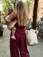 Wildride toddler swing carrier, Marie Marie x Wildride Orange Graphic, Wildride väikelapse kandekott Orange Graphic